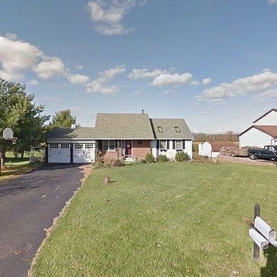 65 Woodstock Ln, Brockport, NY 14420