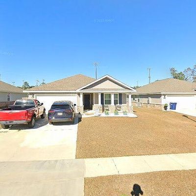 6134 Stream Bank Dr, Theodore, AL 36582