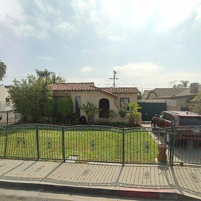 7108 Arbutus Ave, Huntington Park, CA 90255