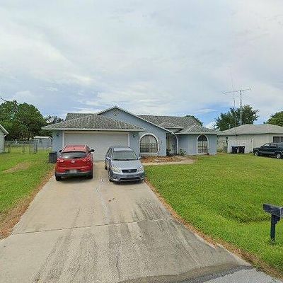 1051 Flower St Nw, Palm Bay, FL 32907