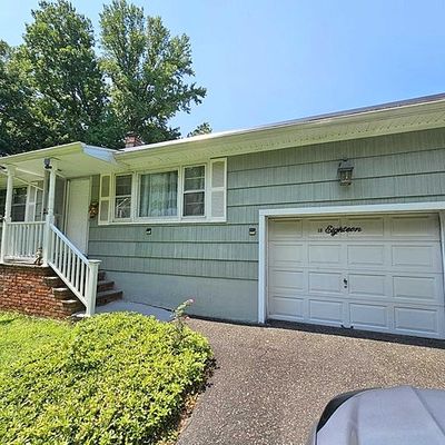 18 Riverside Dr, Pequannock, NJ 07440