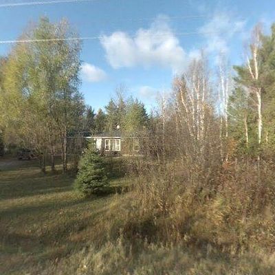 3697 Elder Rd, Carp Lake, MI 49718