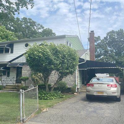 34 Sherman St, Roosevelt, NY 11575