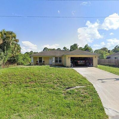 916 Avery St, Lehigh Acres, FL 33974