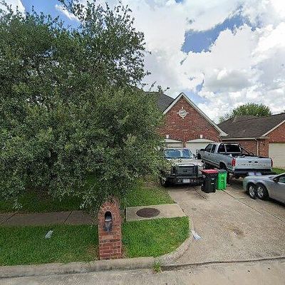 1226 N Arbor Bough Cir, Fresno, TX 77545