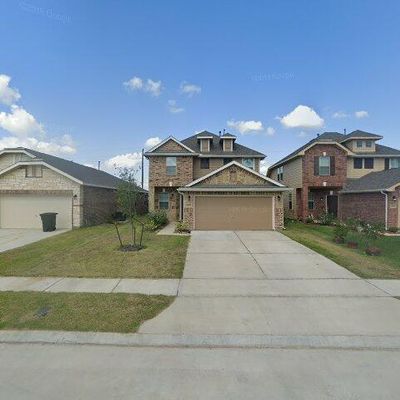 10911 Sun River Falls Dr, Humble, TX 77396