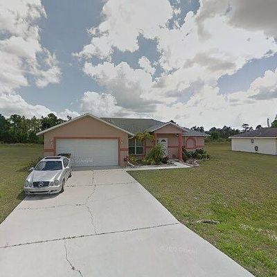 1614 Covington Meadows Cir, Lehigh Acres, FL 33936