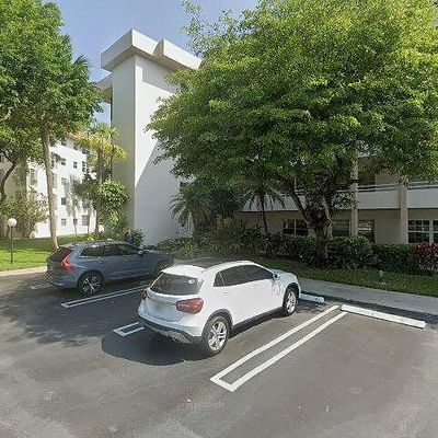 3900 Oaks Clubhouse Dr #201, Pompano Beach, FL 33069