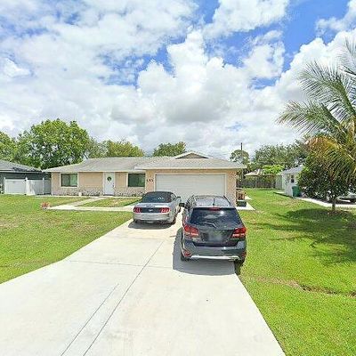 553 Sw Violet Ave, Port Saint Lucie, FL 34983