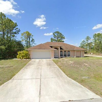 735 Chattman St E, Lehigh Acres, FL 33974