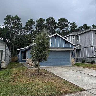 145 Camelot Place Ct, Conroe, TX 77304