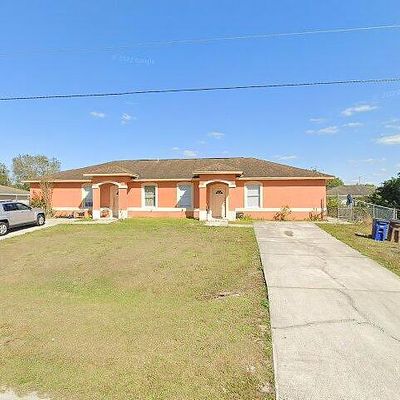 313/315 Harold Ave S, Lehigh Acres, FL 33973