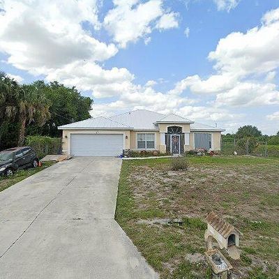 817 Casper Yost St E, Lehigh Acres, FL 33974