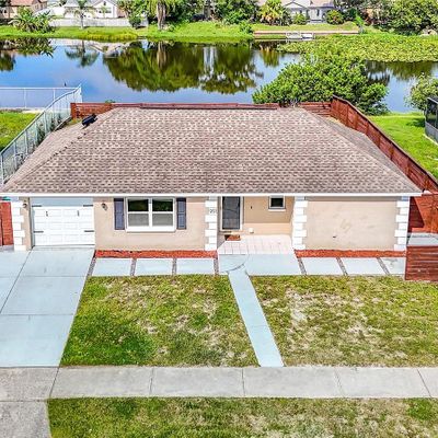 1203 Mandarin Dr, Holiday, FL 34691