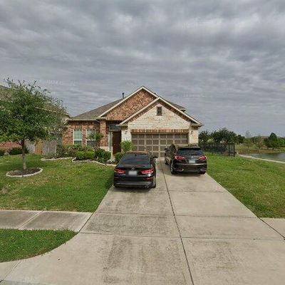 20610 Arrow Falls Ln, Richmond, TX 77407