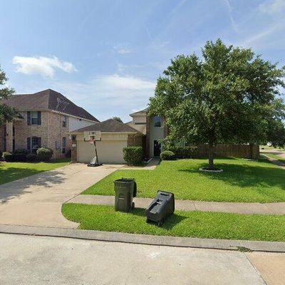 9131 Creekside Ct, Hitchcock, TX 77563