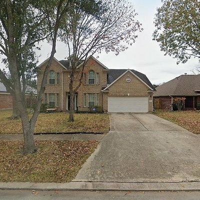 11202 Timbercreek Falls Dr, Houston, TX 77095