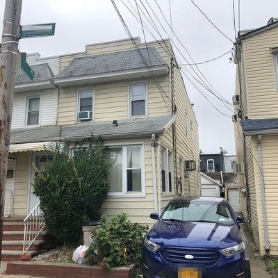 10520 103 Rd Dr, Ozone Park, NY 11417