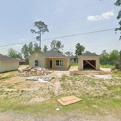 210 Red Bud Ln, Onalaska, TX 77360