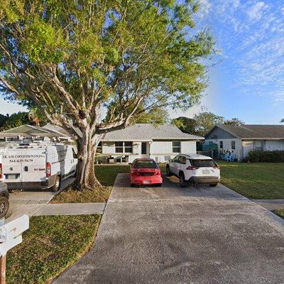 4611 Arthur St, Palm Beach Gardens, FL 33418