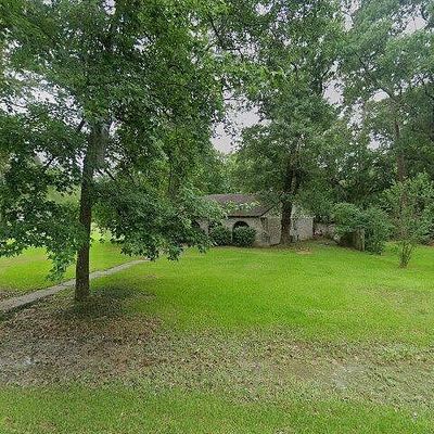 18130 Whispering Pines Dr, Conroe, TX 77302