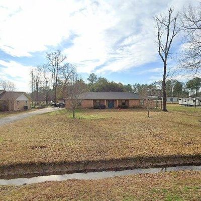 219 Pinemont Dr, Sour Lake, TX 77659