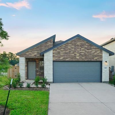 303 Shady Cedar Hill Ln, Willis, TX 77378