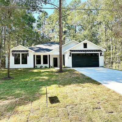 439 Whisperwood Drive, Onalaska, TX 77360