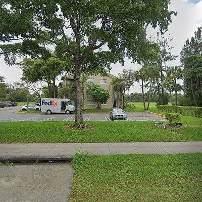 1068 N Benoist Farms Rd #105, West Palm Beach, FL 33411