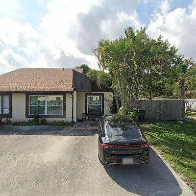 3751 Mil Pond Ct, Greenacres, FL 33463