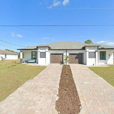 129/131 Ivan Ave S, Lehigh Acres, FL 33973