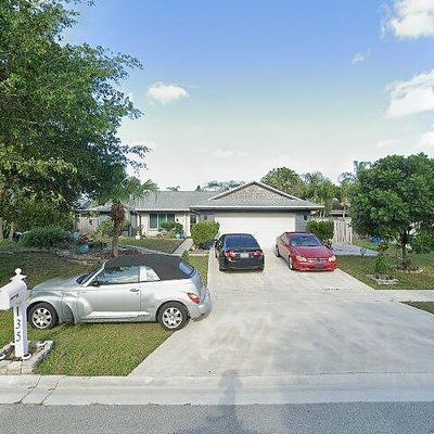 135 Parkwood Dr, Royal Palm Beach, FL 33411