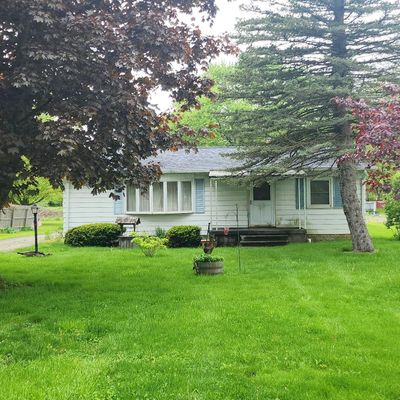 1056 Adams Rd, Burton, MI 48509