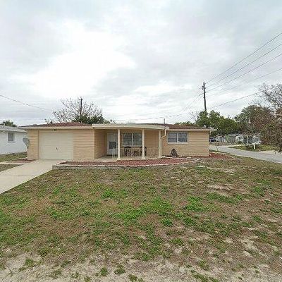 1502 Sentinel St, Holiday, FL 34690