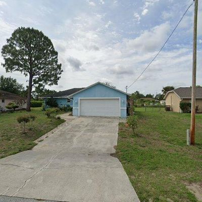 1244 Ermine St E, Lehigh Acres, FL 33974