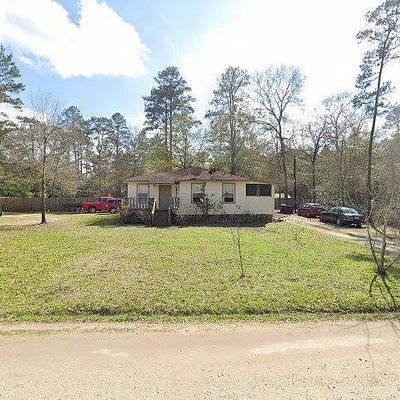 11076 Woodside Dr, Plantersville, TX 77363