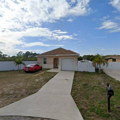 404 Rushmore Ave S, Lehigh Acres, FL 33936