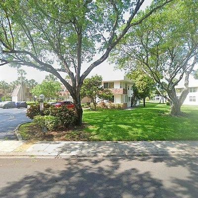 3621 Oaks Clubhouse Dr #104, Pompano Beach, FL 33069