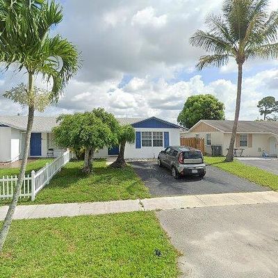 5075 Grant Ln, West Palm Beach, FL 33415