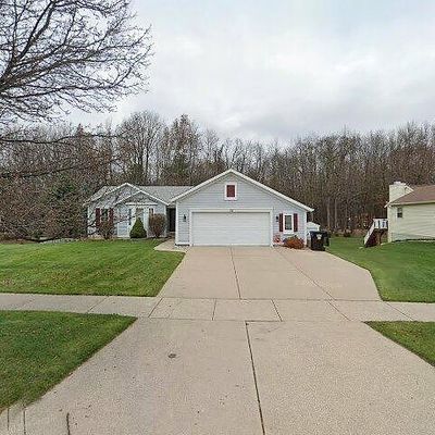 73 Teasel St Ne, Comstock Park, MI 49321